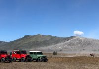 4WD jeep crossing the Sea of Sand at Mount Bromo.