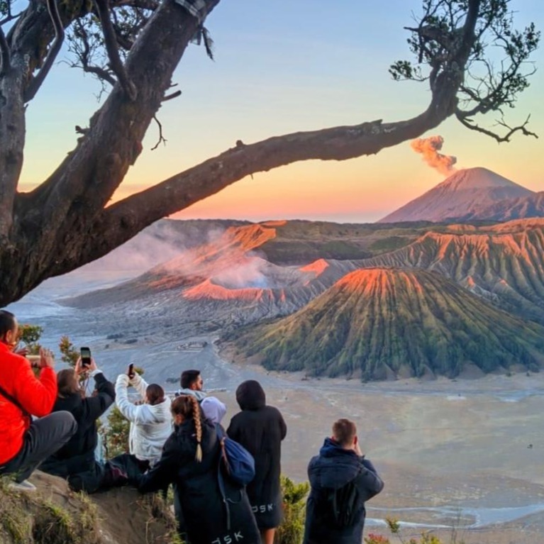 Bromo ijen travel guide is Sunrise view over Mount Bromo volcano with golden sky and volcanic landscape in East Java, Indonesia